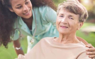 Caregiver assisting elderly patient with dementia