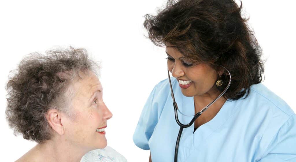 Routine health check by nurse for a patient managing diabetes