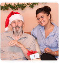 home_thumb_img2 patient christmas hat with nurse