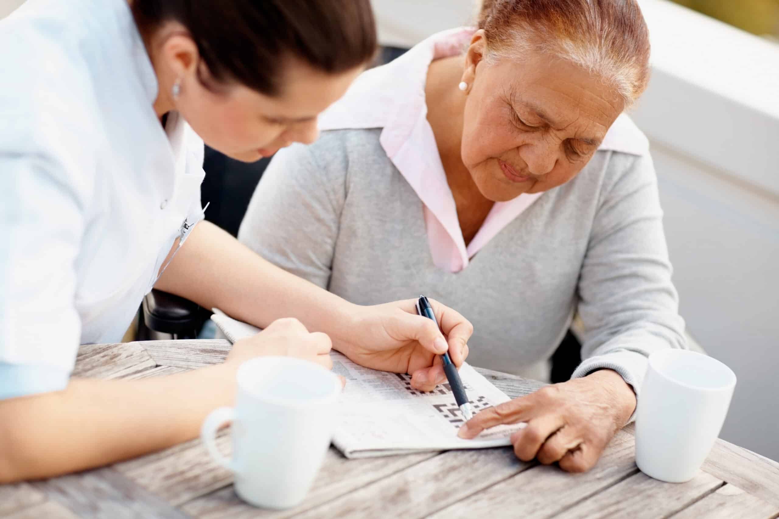 A-1-Home-Care-Care-Plan patient with knee brace and a physical therapist