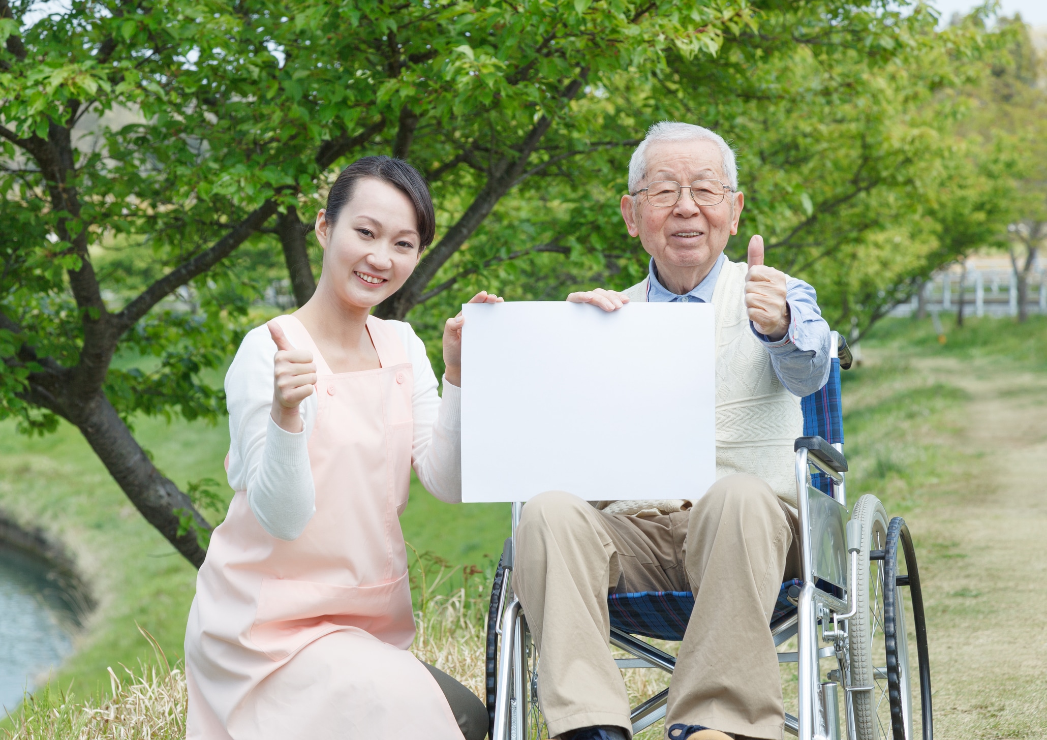 Japanese Nurse in home care elder and a lady