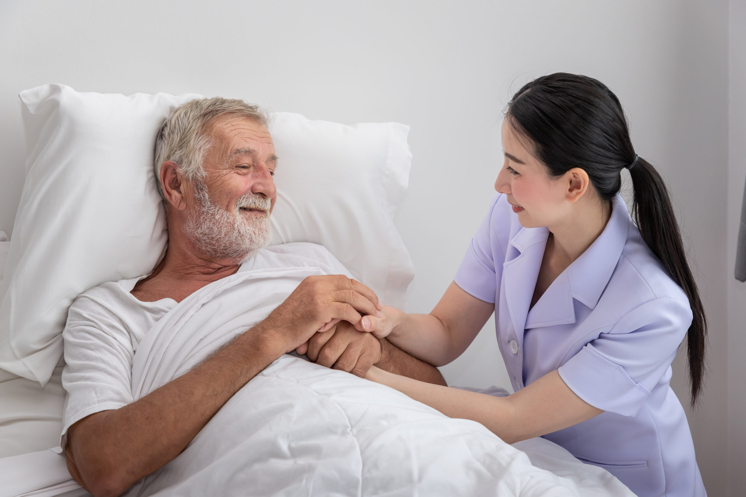 patient with knee brace and a physical therapist