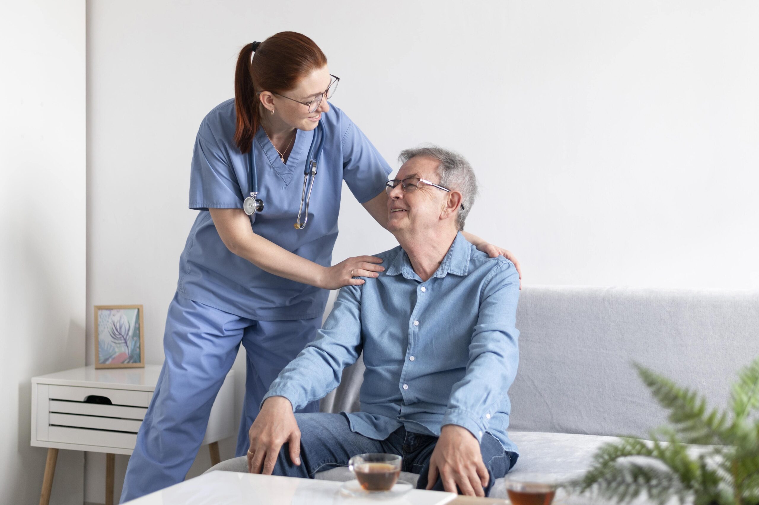 patient with walking aid assisted by nurse