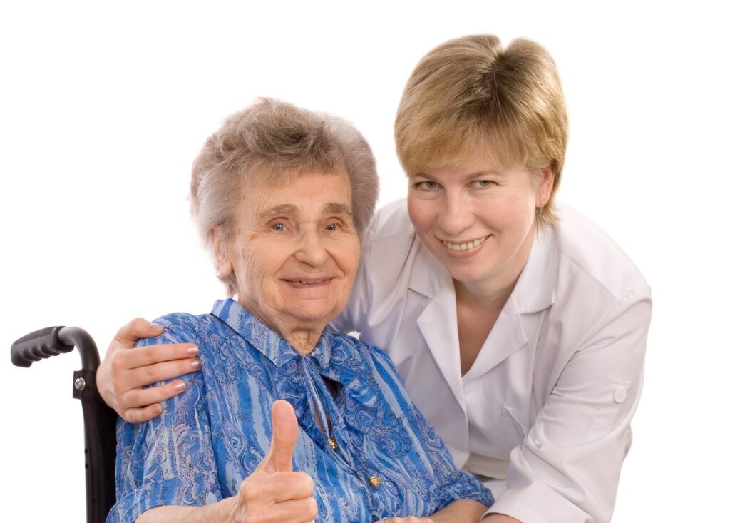 Caregiver with patient in wheelchair