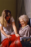Compassionate nurse assisting a multiple sclerosis patient