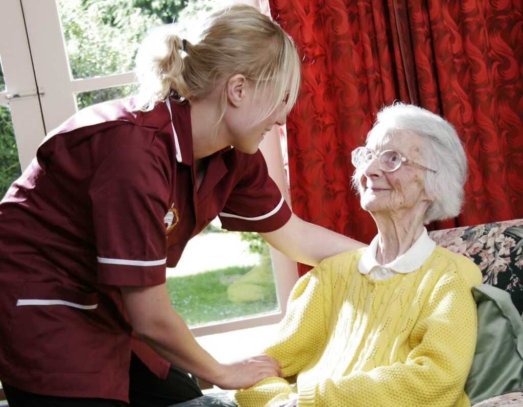 Sincere Cargivers taking care of elderly patient